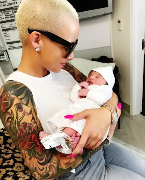 Amber Rose poses with Dream Kardashian